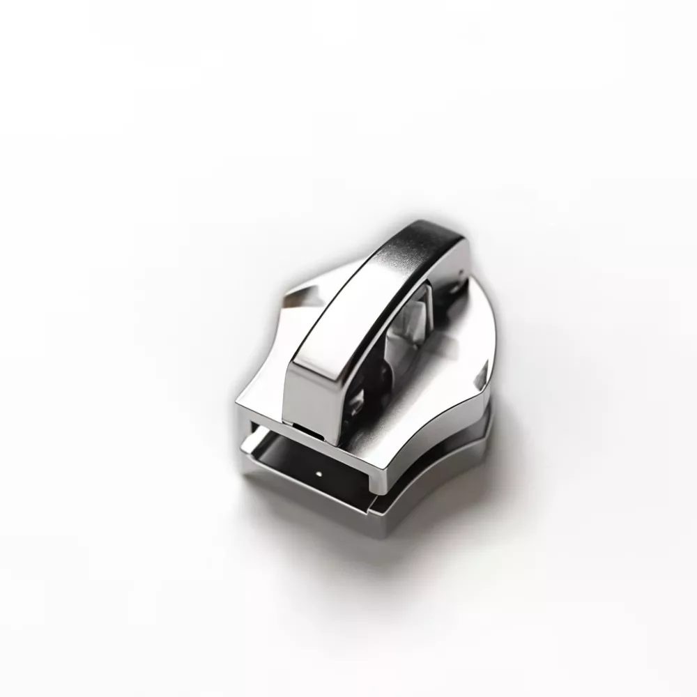 Automaattisesti lukittuva liukusäädin metallivetoketjulle