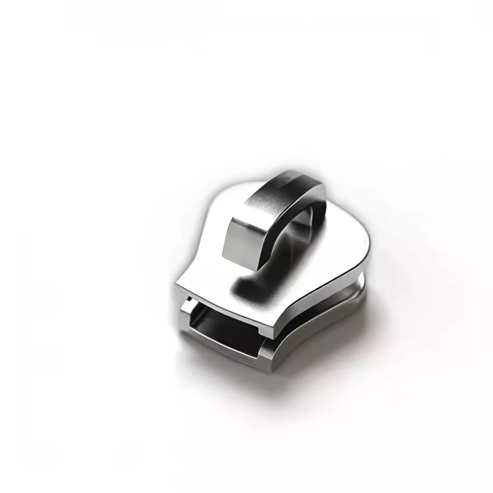 Lukimaton liukusäädin muovivetoketjulle