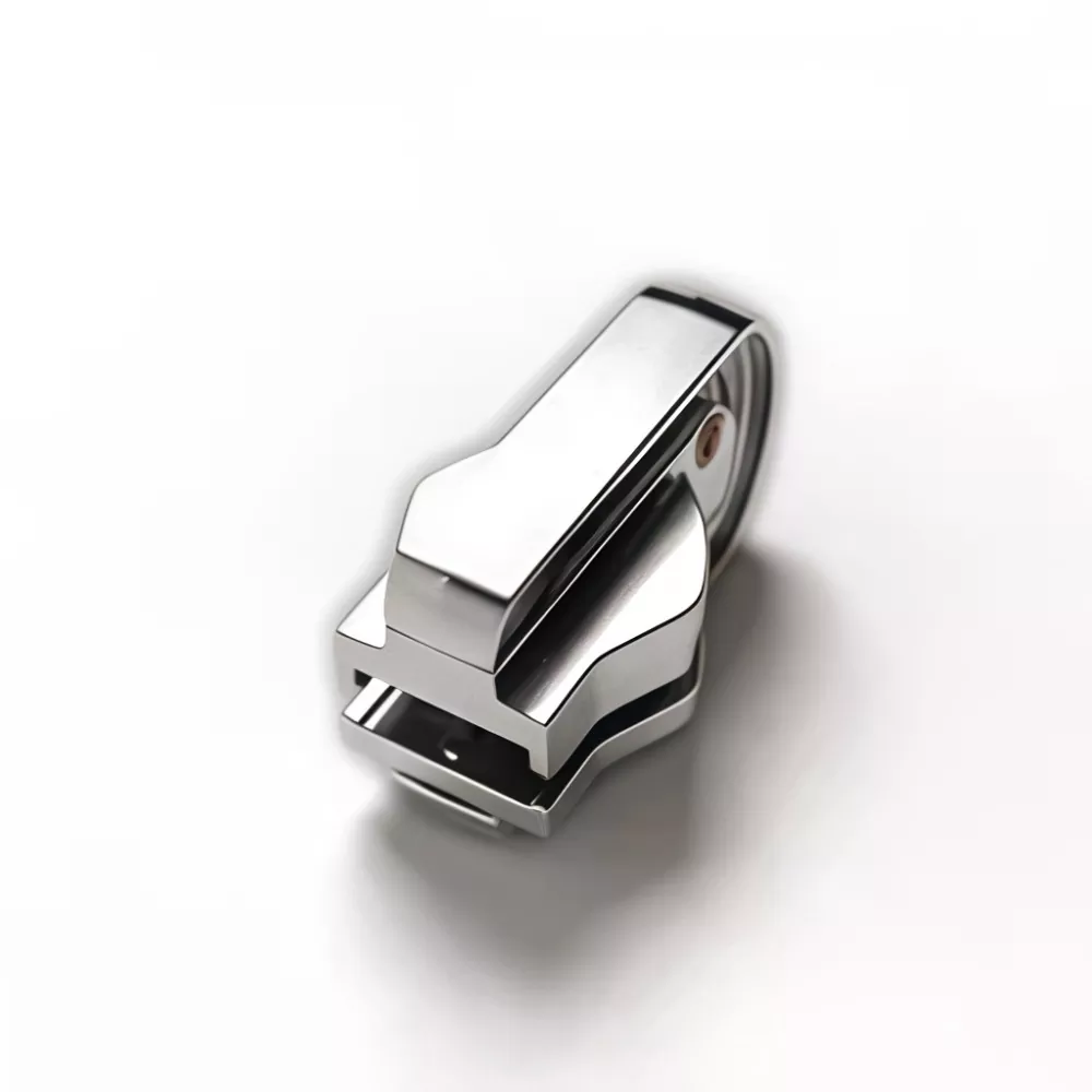 Käännettävä liukusäädin nailonvetoketjulle