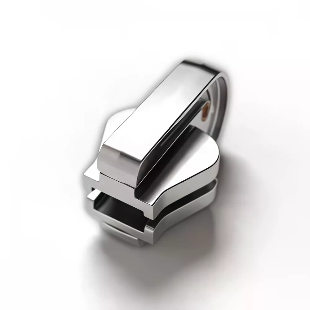 Käännettävä liukusäädin muovivetoketjulle